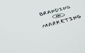 A minimalist image featuring the words 'Branding' and 'Marketing' on a white background, ideal for digital marketing themes. - Photo by Eva Bronzini on Pexels