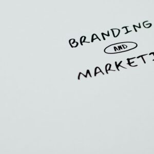 A minimalist image featuring the words 'Branding' and 'Marketing' on a white background, ideal for digital marketing themes. - Photo by Eva Bronzini on Pexels